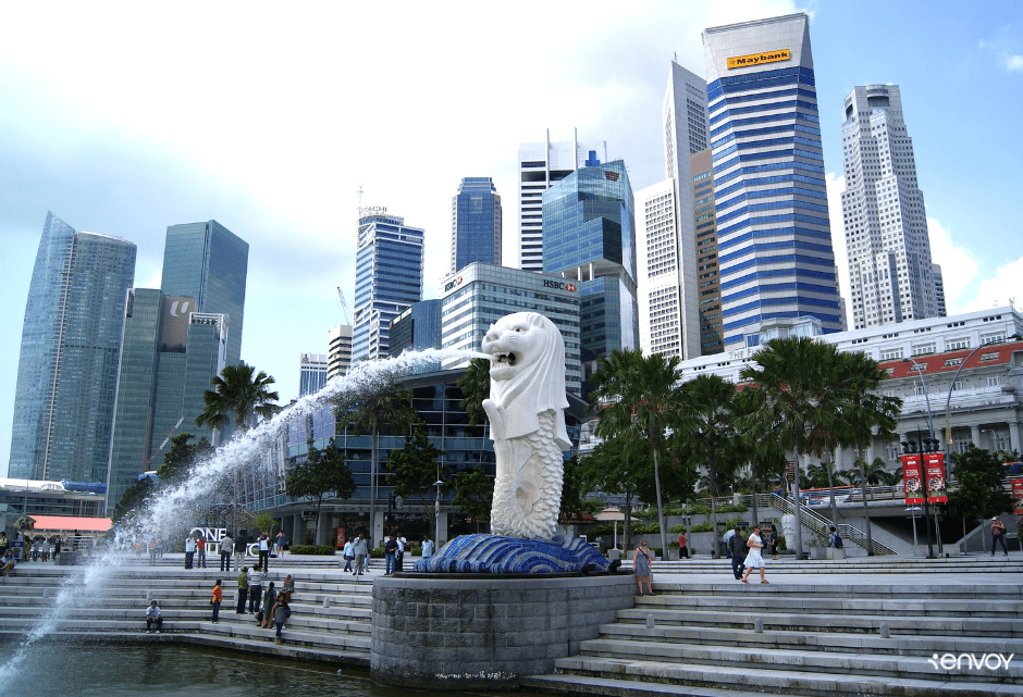 Image of Singapore city skyline and dragon fountain with steps leading towards water.